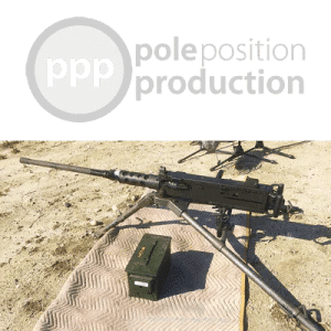 An M2 Browning .50 cal set up outdoors for a machine gun sound effects library on Sonniss, ammo box on sandy ground.