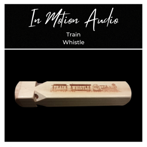 Wooden train whistle featuring the words “Train Whistle” and a printed train graphic, positioned beneath the text “In Motion Audio Train Whistle” on a black background.