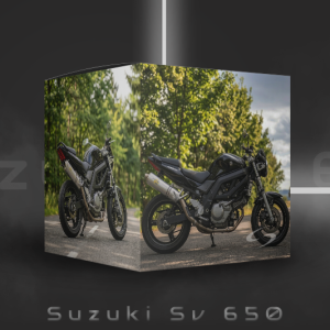 Two views of a black Suzuki SV 650 motorcycle are displayed on a cube with green trees in the background. The text “Suzuki Sv 650” appears below on a dark background.