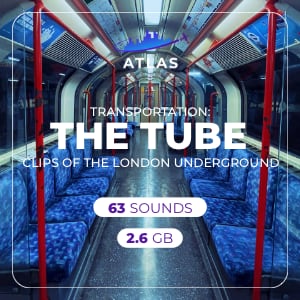 Empty London Underground train carriage from the Transportation: London - The Tube set features blue patterned seats and poles.