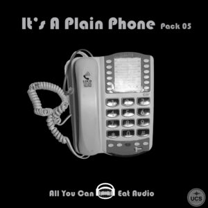 Plain Phone_Pack 05 landline telephone with a corded handset, large buttons, and memory directory on a black background.