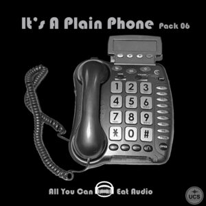 It’s A Plain Phone_Pack 06 black and white desk telephone featuring large buttons and a coiled handset lead.