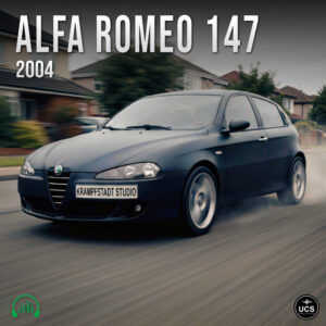 A dark gray 2004 Alfa Romeo 147 compact car drives along a suburban road with visible motion blur.