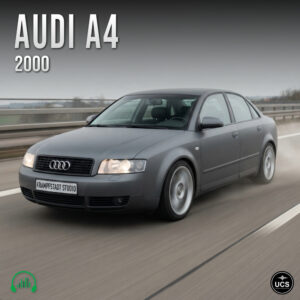 Matte grey 2000 Audi A4 sedan drives on a highway with motion blur.