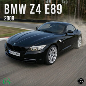 Black BMW Z4 E89 2009 sports car drives quickly around a track, kicking up dust from the roadside.