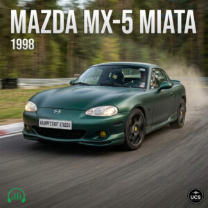 1998 Mazda MX-5 Miata sports car in dark green driving quickly around a curved racetrack.