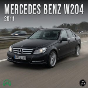 Black Mercedes-Benz C-Class W204 2011 saloon drives on a motorway, captured with motion blur.
