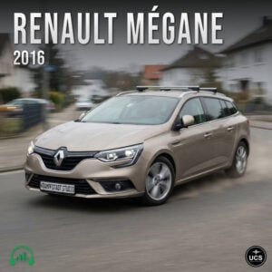 Beige 2016 Renault Megane station wagon drives along a suburban street with motion blur.