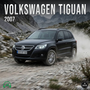 Black 2007 Volkswagen Tiguan compact crossover SUV drives fast on a gravel mountain road, kicking up dust.